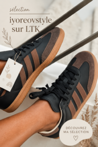Femme consultant LTK sur son smartphone pour composer un look tendance.
