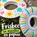 Un frisbee coloré fait d'une assiette en papier, prêt à être lancé dans le jardin